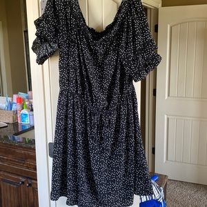 Andree. Black with white dots. Draw string at waist. Ruffle sleeve. 2X.